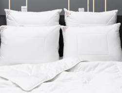 Подушка стеганная GERMAN GRASS MERINO WOOL GRASS 50х68 регулируемая