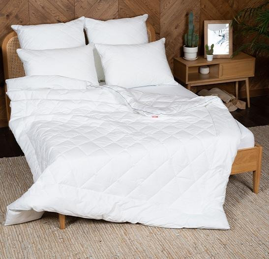 Подушка из хлопка и полиэфира в тике стеганая Легкие Сны МИРЭЛЬ 50х68 регулируемая